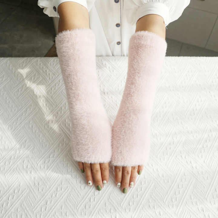 Half finger plush gloves for women's winter warmth.