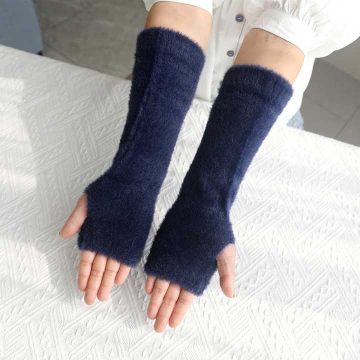 Half finger plush gloves for women's winter warmth.