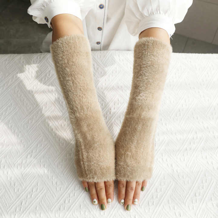 Half finger plush gloves for women's winter warmth.