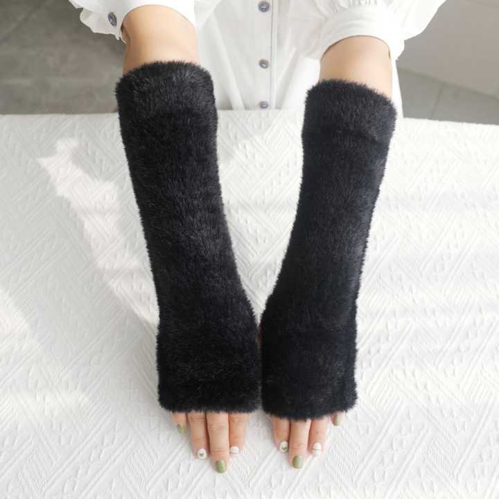 Half finger plush gloves for women's winter warmth.